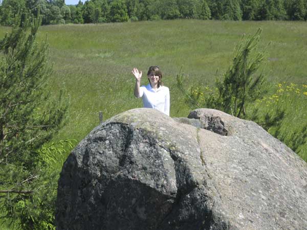 Ruta atop the third largest stone in Lithuania