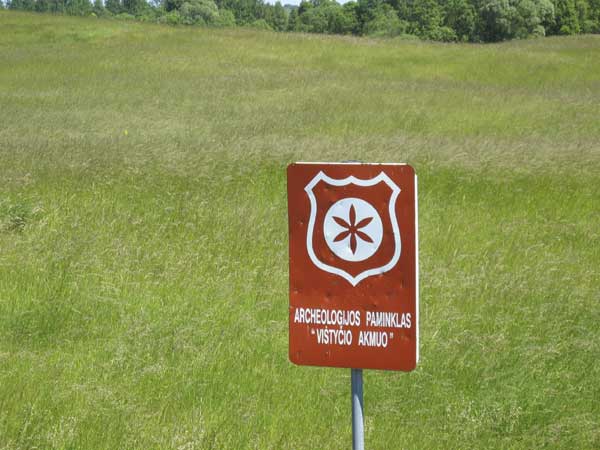 Signs posted indicating the position of the border